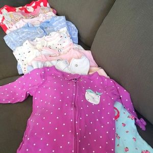 6-9 & 9 month old footie pjs.